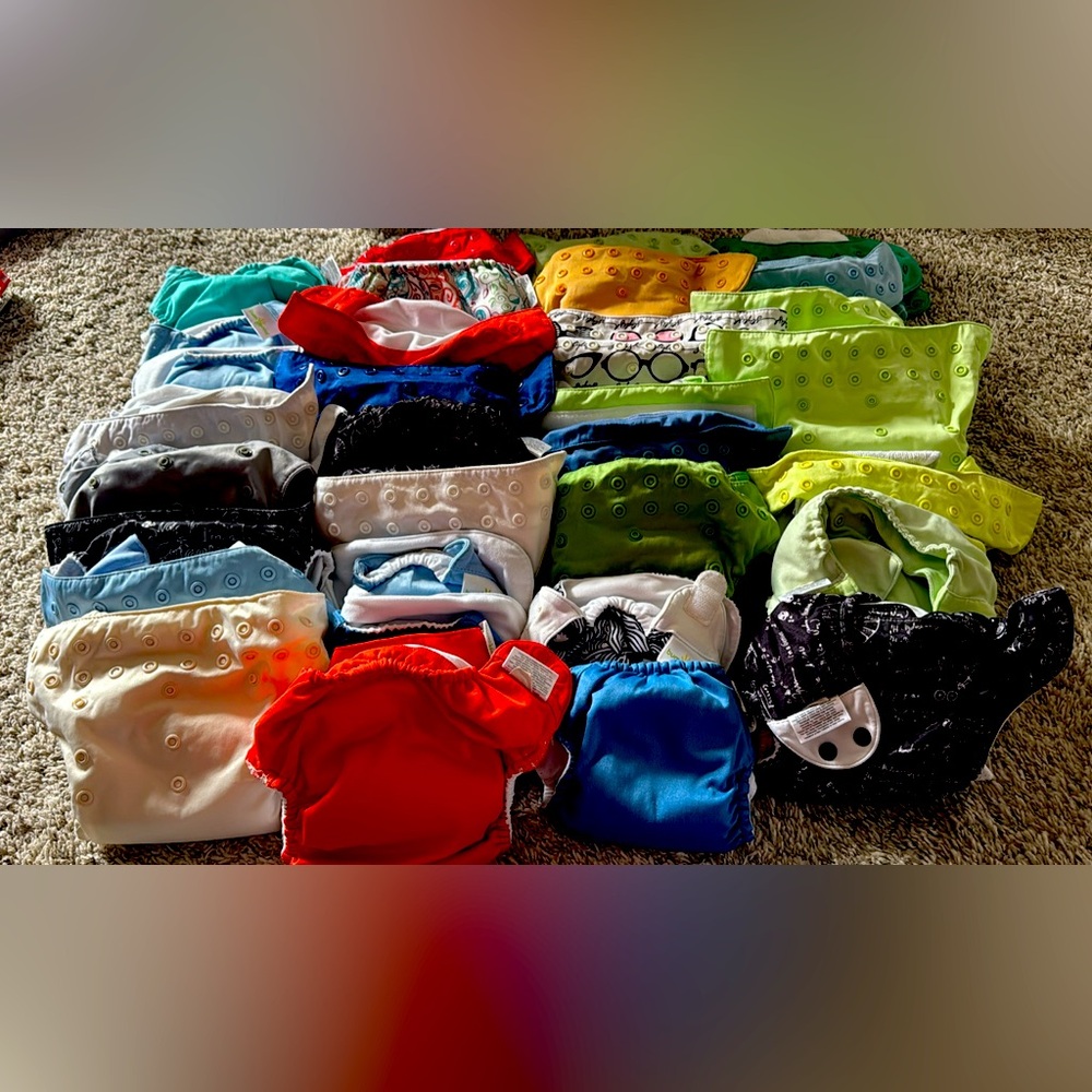 Bumgenius OS with a few newborn covers with inserts cloth diapers